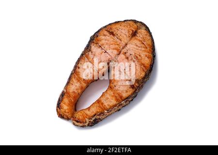 Nahaufnahme appetitliches gegrilltes Lachssteak auf weißem Hintergrund. Seefisch. Natürliche Lebensmittel. Isoliertes Objekt Stockfoto