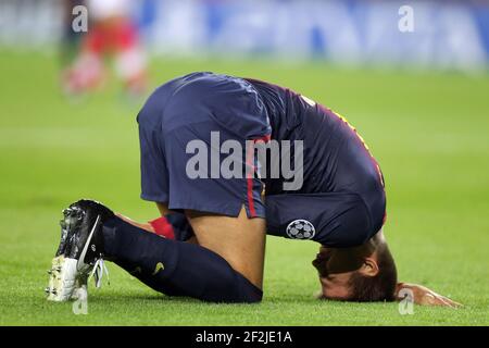 FUSSBALL - UEFA CHAMPIONS LEAGUE 2012/2013 - GRUPPENPHASE - GRUPPE G - FC BARCELONA / SPARTAK MOSKAU - 19/09/2012 - FOTO MANUEL BLONDAU / AOP PRESS / DPPI - GERARD PIQUE GESTEN NACH DER VERLETZUNG Stockfoto