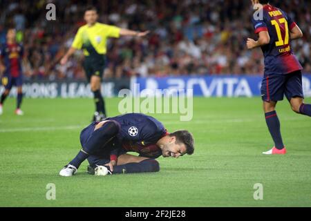 FUSSBALL - UEFA CHAMPIONS LEAGUE 2012/2013 - GRUPPENPHASE - GRUPPE G - FC BARCELONA / SPARTAK MOSKAU - 19/09/2012 - FOTO MANUEL BLONDAU / AOP PRESS / DPPI - GERARD PIQUE GESTEN NACH DER VERLETZUNG Stockfoto