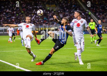 Inter Mailand Mauro Icardi, Turin Emiliano Moretti und Armando Izzo in Aktion während der italienischen Serie A Fußballspiel Inter Mailand gegen Torino am 26. August 2018 im San Siro Stadion in Mailand, Italien, Foto Morgese - Rossini / DPPI Stockfoto