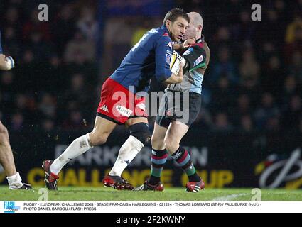 RUGBY - EUROPÄISCHE HERAUSFORDERUNG 2003 - STADE FRANCAIS / HARLEQUINS - 021214 - THOMAS LOMBARD (ST-F) / PAUL BURKE (HAR) - FOTO DANIEL BARDOU / FLASH DRÜCKEN Stockfoto