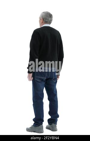 Der Mensch in Jahren steht in vollem Wachstum auf einem zurück Weißer Hintergrund Stockfoto