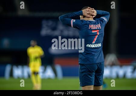 Paris, Frankreich. März 2021, 14th. Kylian Mbappe von Paris Saint-Germain reagiert während des französischen Fußballspiels Ligue 1 zwischen Paris Saint Germain (PSG) und dem FC Nantes am 14. März 2021 im Stadion Parc des Princes in Paris, Frankreich. Quelle: Aurelien Morissard/Xinhua/Alamy Live News Stockfoto