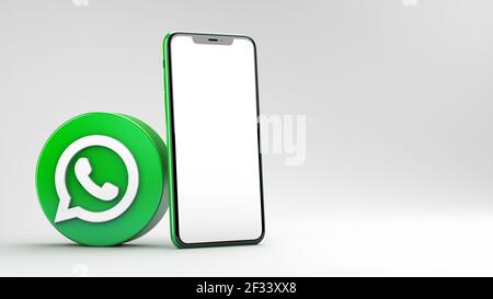 Valencia, Spanien - März, 2021: WhatsApp Icon mit Handy-Mockup isoliert auf weißem Hintergrund in 3D Rendering. WhatsApp ist ein Online-Social-med Stockfoto