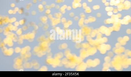 Abstrakt golden Glitzer funkeln Hintergrund oder Gold Bokeh Konfetti Stockfoto