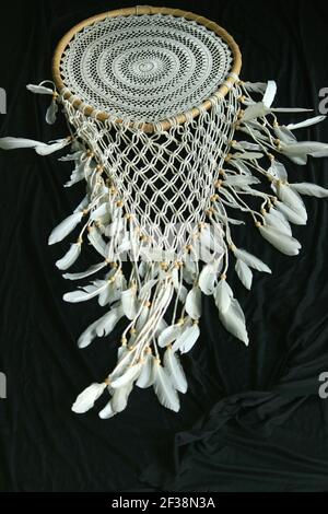 Diese Kunst Macrame Handwerk aus gehäkeltem Seil für die Inneneinrichtung zu Hause Dekoration. Stockfoto