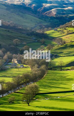 Picturesque Dales village (cottages & farms) & River Wharfe, nestling by hills & hillsides in steep-sided valley - Hubberholme, Yorkshire, England, UK
