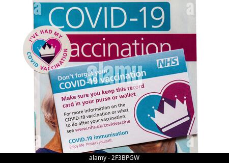 Covid-19 Impfinformationsblatt von NHS mit ich hatte meine Covid Impfpass & Impfpass Stockfoto