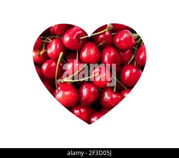 Kirschen in Herzform isoliert auf einem weißen. Frische rote Kirschen. Textur Heidelbeeren aus der Nähe. Kirschfrucht. Kirschen mit Platz für Text. Stockfoto