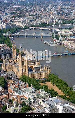 PALACE OF WESTMINSTER, London. Blick auf das London Eye, Houses of Parliament und Themse Rad. Stockfoto