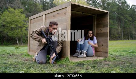 JUSTIN HARTLEY und SYLVIA GRACE CRIM in THE HUNT (2020), Regie CRAIG ZOBEL. Quelle: BLUMHOUSE PRODUCTIONS / Album Stockfoto