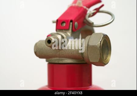 Die Oberseite eines kleinen Feuerlöschers Stockfoto