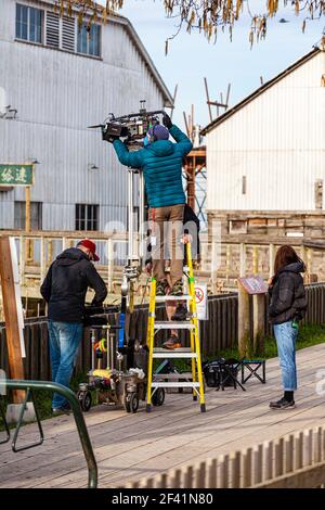 Kameramann in Aktion während der Dreharbeiten eines koreanischen Films in Steveston British Columbia Kanada Stockfoto