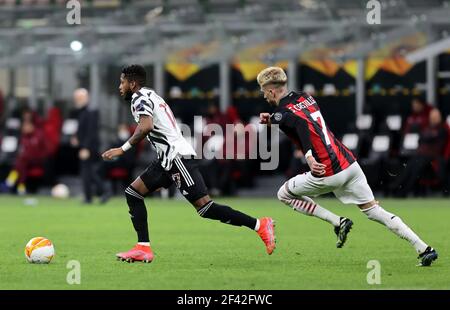 Fred von Manchester United (links) und Samu Castillejo von AC Mailand während der UEFA Europa League Runde von sechzehn Spielen im San Siro Stadion in Mailand, Italien. Bilddatum: Donnerstag, 18. März 2021. Stockfoto