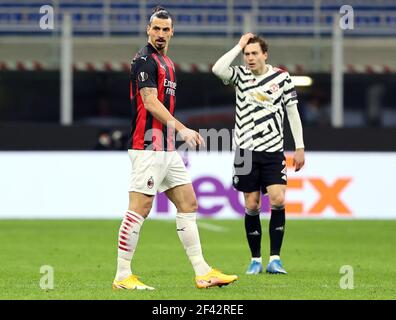 AC Mailands Zlatan Ibrahimovic (links) und Manchester United's Victor Lindelof während der UEFA Europa League Runde von sechzehn Spielen im San Siro Stadion in Mailand, Italien. Bilddatum: Donnerstag, 18. März 2021. Stockfoto