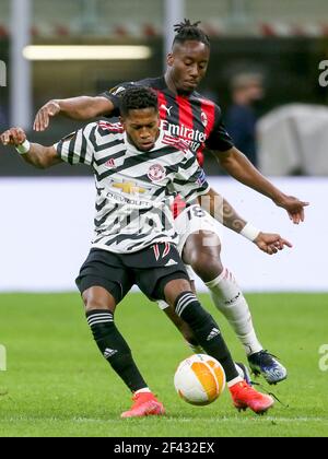 Mailand, Italien. März 2021, 18th. MAILAND, ITALIEN - 18. MÄRZ: Fred von Manchester United und Soualiho Meite von AC Mailand während des UEFA Europa League-Spiels zwischen AC Mailand und Manchester United FC im Stadio San Siro am 18. März 2021 in Mailand, Italien (Foto von Ciro Santangelo/Orange Pictures) Credit: Orange Pics BV/Alamy Live News Stockfoto