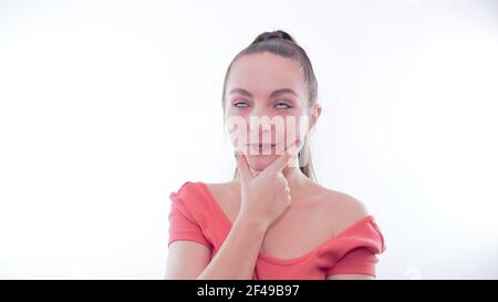 Gesichtsausdrücke der jungen Frau im Studio Stockfoto