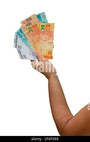 Halten brasilianisches Geld real, Rechnungen von 200, 100, 50 und 20 isoliert auf weißem Hintergrund. Stockfoto