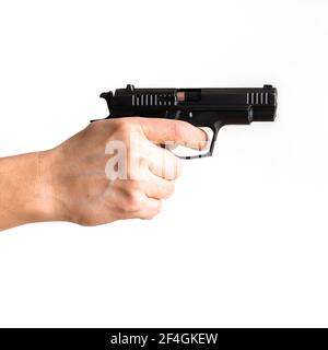 Pistole, oder Auto-Loader kurze Pistole in der Hand der Frau Vorbereitung oder Selbstladung Aufforderung zur Verwendung. Mann hält Pistole Ziel Pistole in der Hand bereit zu schießen. Das c Stockfoto