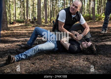 MICHAEL KEATON und DYLAN O'BRIEN in AMERICAN ASSASSIN (2017), Regie: MICHAEL CUESTA. Copyright: Nur für redaktionelle Verwendung. Keine Verkaufsförderung oder Buchumschläge. Dies ist ein öffentlich verteiltes Handout. Nur Zugriffsrechte, keine Lizenz des Urheberrechts. Nur zu vervielfältigen in Verbindung mit der Promotion dieses Films. Kredit: LIONSGATE/CBS FILME / SCHWARZ, CHRISTIAN / Album Stockfoto