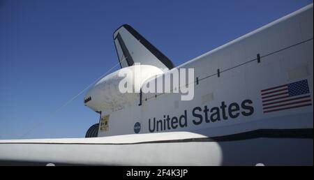 TITUSVILLE, VEREINIGTE STAATEN - 22. Dez 2009: Das Exterieur der Raumfähre mit NASA-Logo und amerikanischer Flagge Stockfoto