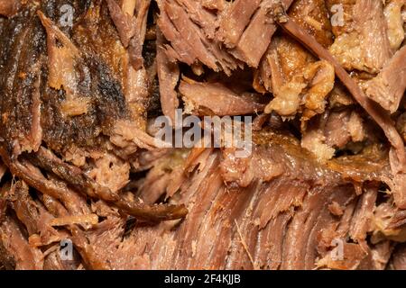 Langsam gekocht zerfetzt gezogen Rindfleisch Nahaufnahme Hintergrund von oben gesehen, Stock Foto Bild Stockfoto