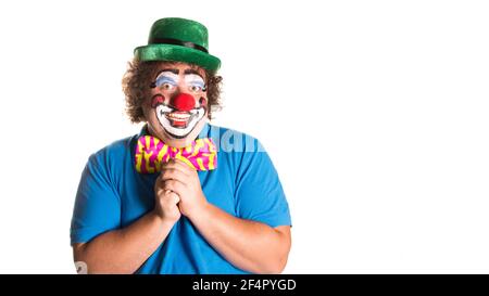 Feiertage. Lustige dicke Clown. Weißer Hintergrund. Stockfoto