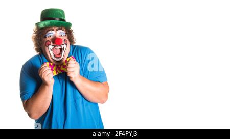 Feiertage. Lustige dicke Clown. Weißer Hintergrund. Stockfoto