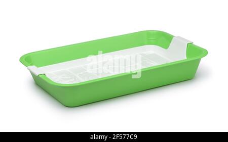 Leerer grüner Plastikkatzenabfallbehälter isoliert auf weiß Stockfoto