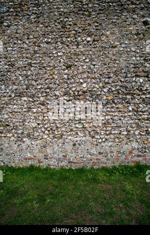 Flint Steinmauer. Burgmauer. Hintergrund. Stockfoto