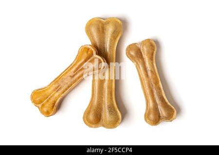 Knochen für Hunde isoliert auf weißem Hintergrund Draufsicht Flat Lay Delicious Leckerbissen für Ihr geliebtes Haustier Futter für Tiere Konzept. Stockfoto