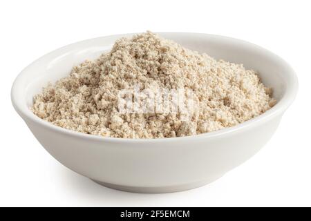 Hafermehl in einer weißen Keramikschale isoliert auf weiß. Stockfoto