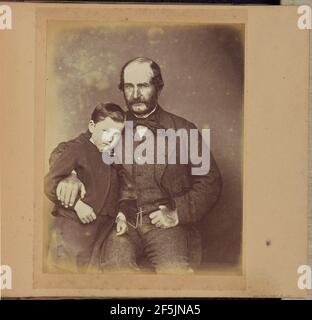 Ein nicht identifizierter Mann und Junge. Stockfoto