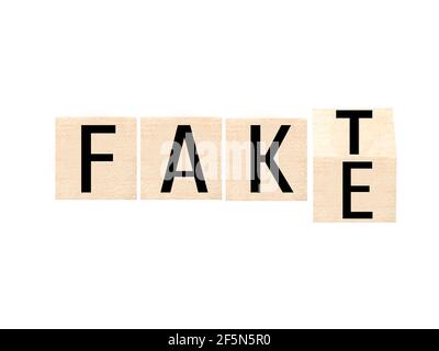Wort Fälschung oder Tatsache isoliert auf weißem Hintergrund Stockfoto