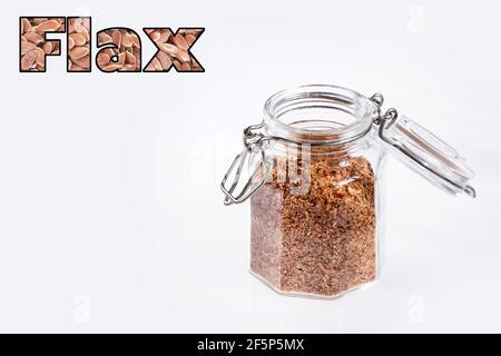 Zerkleinerte Leinsamen im Glas - Linum usitatissimum Stockfoto