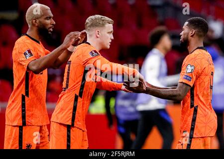 AMSTERDAM, NIEDERLANDE - MÄRZ 27: Ryan Babel von den Niederlanden, Donny van de Beek von den Niederlanden, Georginio Wijnaldum von den Niederlanden während Stockfoto