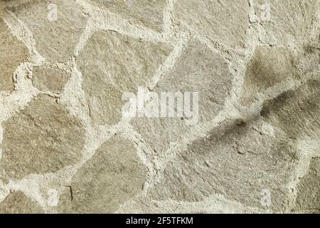 Bodenstruktur aus Steinplatten. Abstrakter Hintergrund Stockfoto