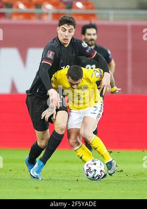 Bukarest, Rumänien. März 2021, 28th. Kai HAVERTZ, DFB 10 Wettkampf um den Ball, Tackling, Duell, Header, zweikampf, Aktion, Kampf gegen Nicolae STANCIU, ROM 7 im Spiel RUMÄNIEN - DEUTSCHLAND 0-1 Rumänien - Deutschland 0-1 Qualifikation für WM 2022, WM Quali, Saison 2020/2021, 28. März 2021 in Bukarest, Bukarest, Rumänien. Quelle: Peter Schatz/Alamy Live News Stockfoto