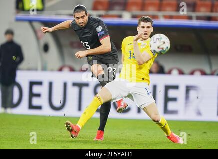 Bukarest, Rumänien. März 2021, 28th. Emre CAN, DFB 23 Wettkämpfe um den Ball, Tackling, Duell, Header, zweikampf, Aktion, Kampf gegen Ianis HAGI, ROM 14 im Spiel RUMÄNIEN - DEUTSCHLAND 0-1 Rumänien - Deutschland 0-1 Qualifikation für WM 2022, WM Quali, Saison 2020/2021, 28. März 2021 in Bukarest, Bukarest, Rumänien. Quelle: Peter Schatz/Alamy Live News Stockfoto