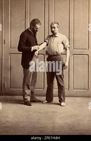 Alphonse Bertillon Measuring Prisoner, 1893 Stockfoto