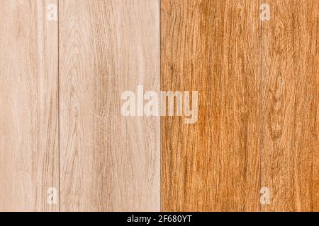 Holzfarbe Beschichtung mit einem abstrakten Muster in hellen und orangen Farben, Tischbrett Hintergrund, Boden Textur. Stockfoto