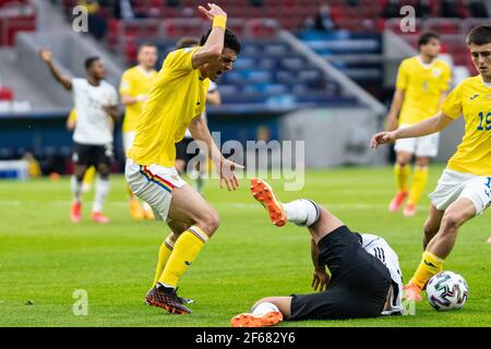 Budapest, Ungarn. März 2021, 30th. Alexandru Pasanu (4) aus Rumänien beim UEFA EURO U-21 Spiel zwischen Deutschland und Rumänien im Bozsik Stadion in Budapest. (Foto Kredit: Gonzales Foto/Alamy Live News Stockfoto