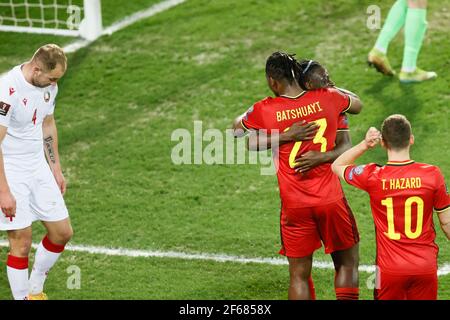 Der Belgier Michy Batshuayi feiert, nachdem er mit 1-0 das Tor erzielt hat Der Belgier Jeremy Doku bei einem Qualifikationsspiel für die Welt Cup 2022 in der g Stockfoto