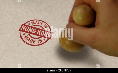 Hergestellt in Hong Kong Stempel und Stempelhand. Fabrik-, Fertigungs- und Produktionslandkonzept. Stockfoto