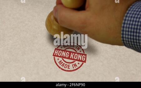 Hergestellt in Hong Kong Stempel und Stempelhand. Fabrik-, Fertigungs- und Produktionslandkonzept. Stockfoto