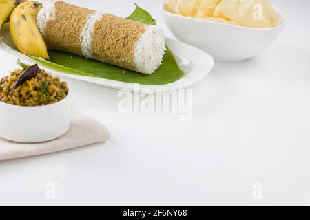 Kerala Breakfast Wheat puttu, gesunde gedünstete Lebensmittel, die das Hauptfrühstück Element der südindischen mit Weizenmehl gemacht ist. Stockfoto