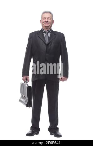 Glücklicher Geschäftsmann steht mit Aktentasche isoliert auf weißem Hintergrund Stockfoto