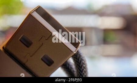 Schließen Sie das USB-Kabel Stockfoto