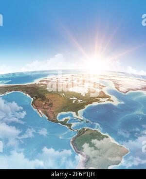Die Sonne scheint durch Wolken, in blauem Himmel, über einer hoch detaillierten Satellitenansicht des Planeten Erde, fokussiert auf Amerika - Elemente, die von der NASA eingerichtet wurden Stockfoto