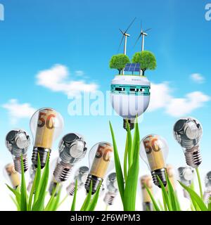 Glühbirne mit Windturbinen, Solarpanel und Münzen auf einer Anlage. Konzept der Kosteneinsparung. Thema „Alternative Energie“. Stockfoto